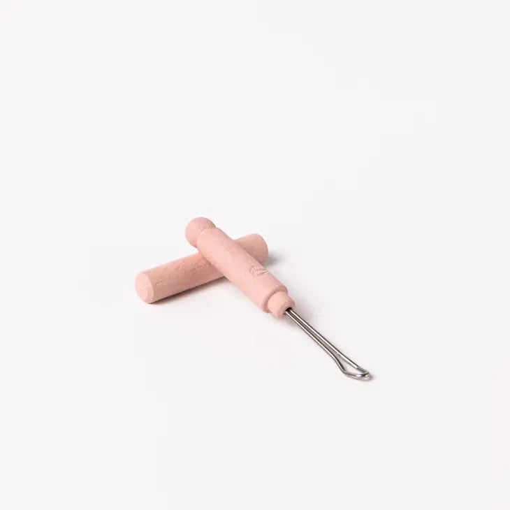 CURE-OREILLE AVEC CAPUCHON