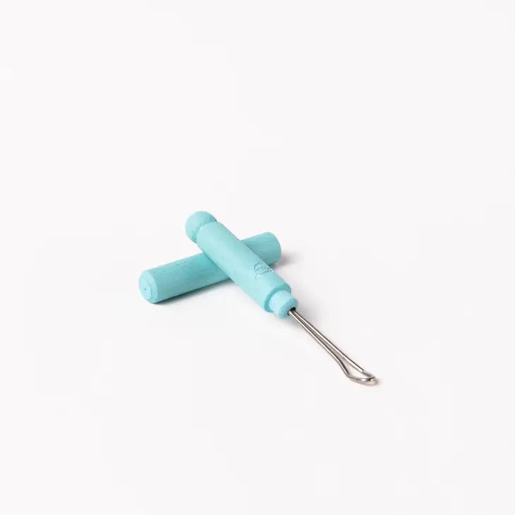 CURE-OREILLE AVEC CAPUCHON