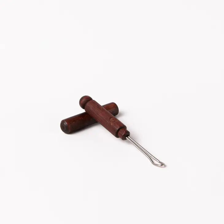 CURE-OREILLE AVEC CAPUCHON